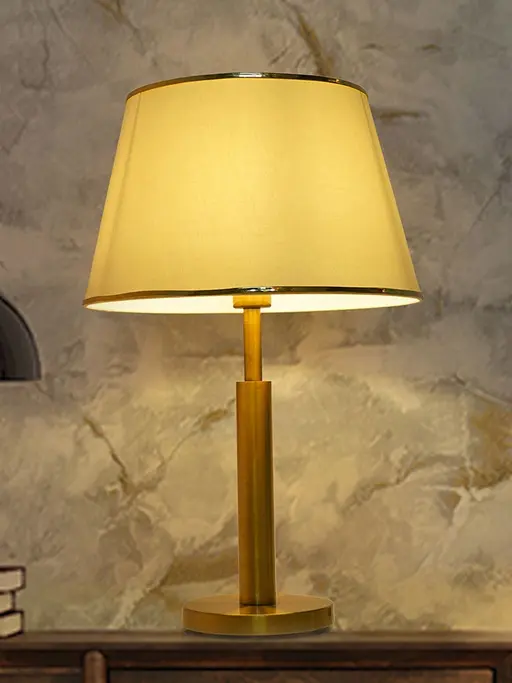 Transitional Brushed Brass Finished Metal Table Lamp with off-White Fabric Shade