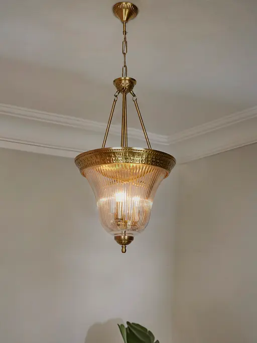 Timeless Elegance: Antique Brass Pendant Light with Unique Cut Glass Enclosure