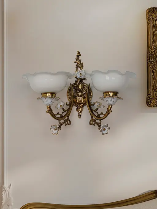 2-Light Antique Brass Cast Aluminium Floral Wall Sconce with Frilled White Glass Shades